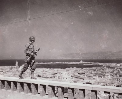 A GI walks guard duty over Naples - from liberationtrilogy.com